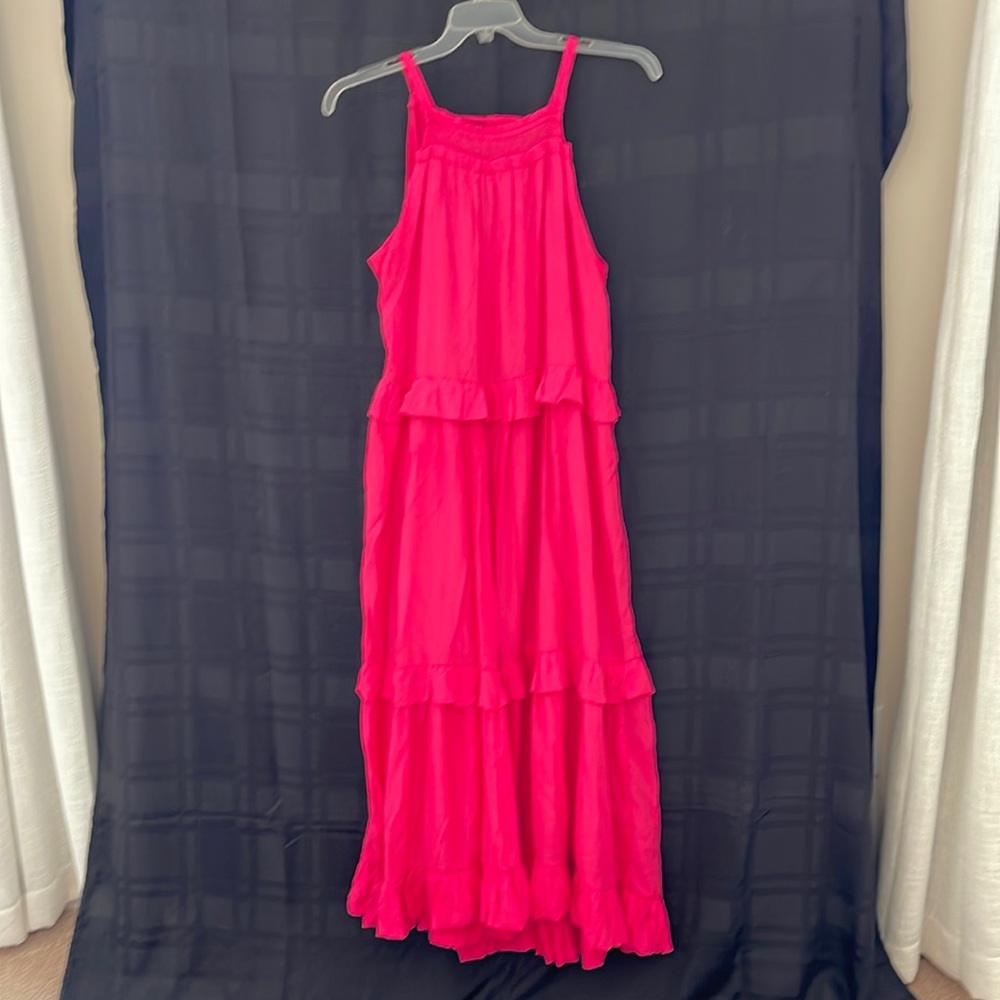 Stunning fuchsia sleeveless ruffled maxi dress. New, without tags. Lined.